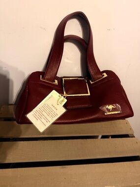 Elegant Wine Red Shoulder Bag with Gold Accents